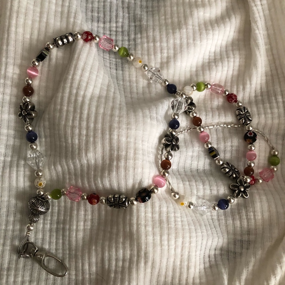 Beads and charms lanyard. Beautiful to take on your next adventure!